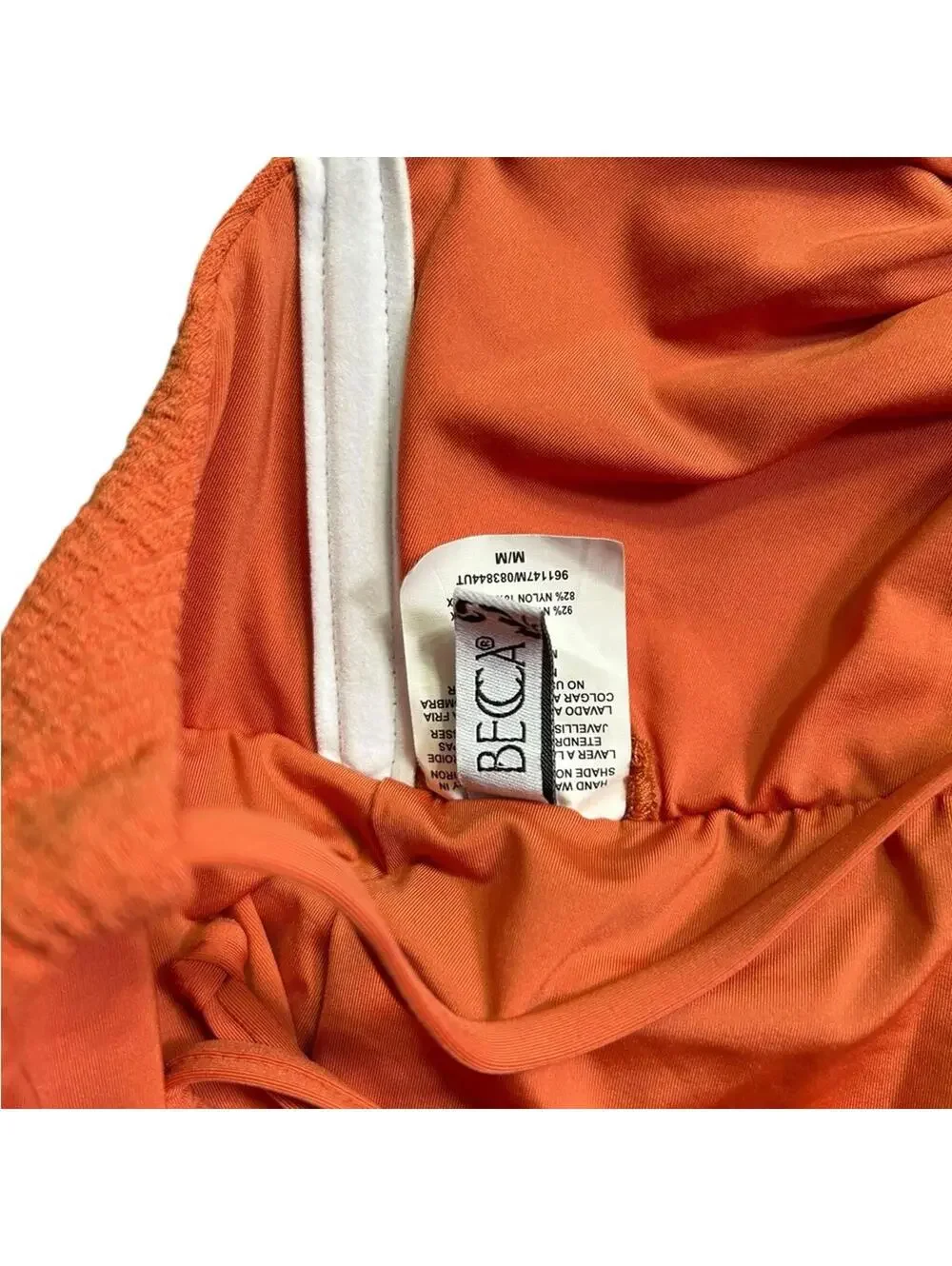 BECCA cut out textured tie back One Piece swimsuit rust orange size M $138 New